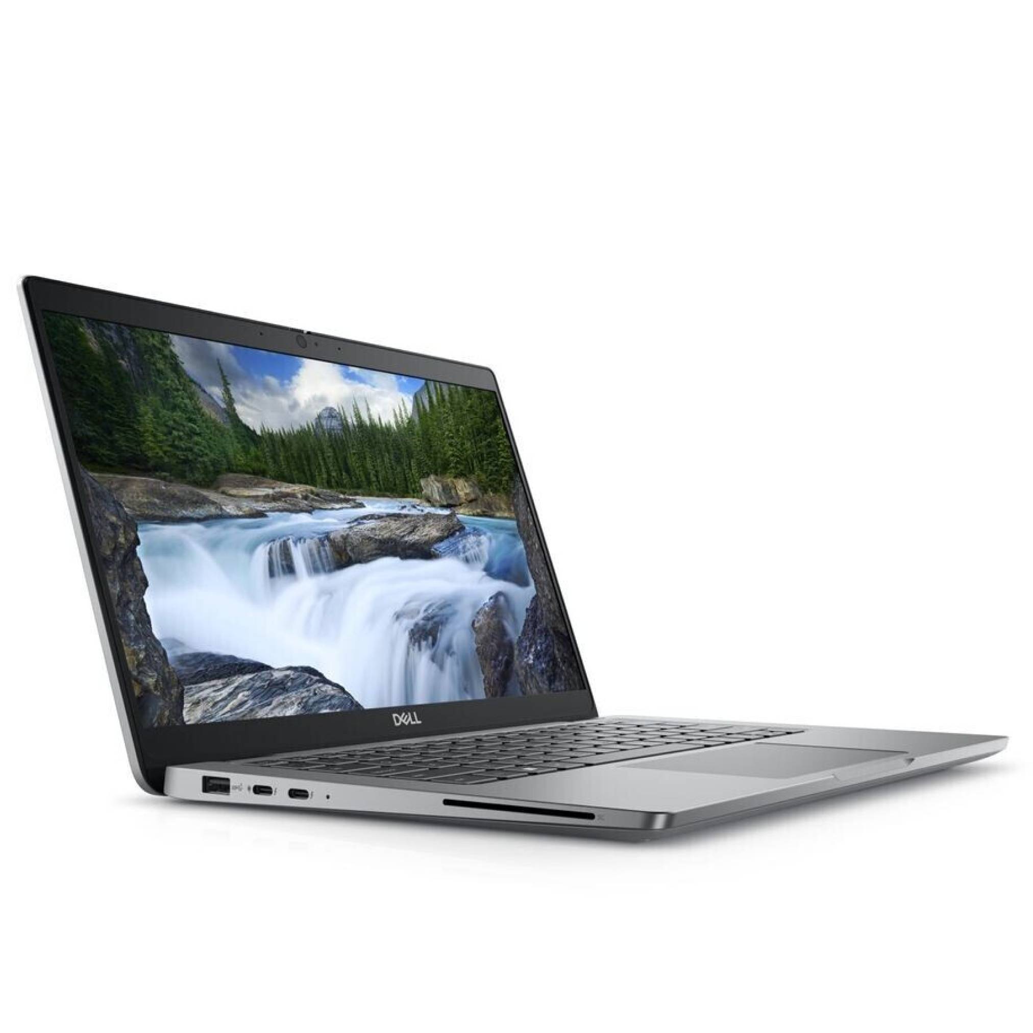 Silber Dell-Laptop in einem Winkel geöffnet, zeigt eine Wasserfalllandschaft auf dem Bildschirm vor einem weißen Hintergrund.
