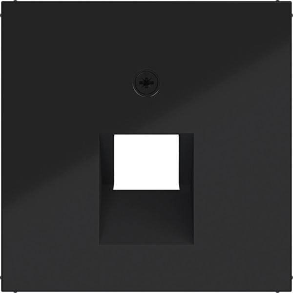 Schwarze Wandplatte mit einer einzelnen zentrierten modularen Öffnung und einem weißen Blindeinsatz in der Mitte.