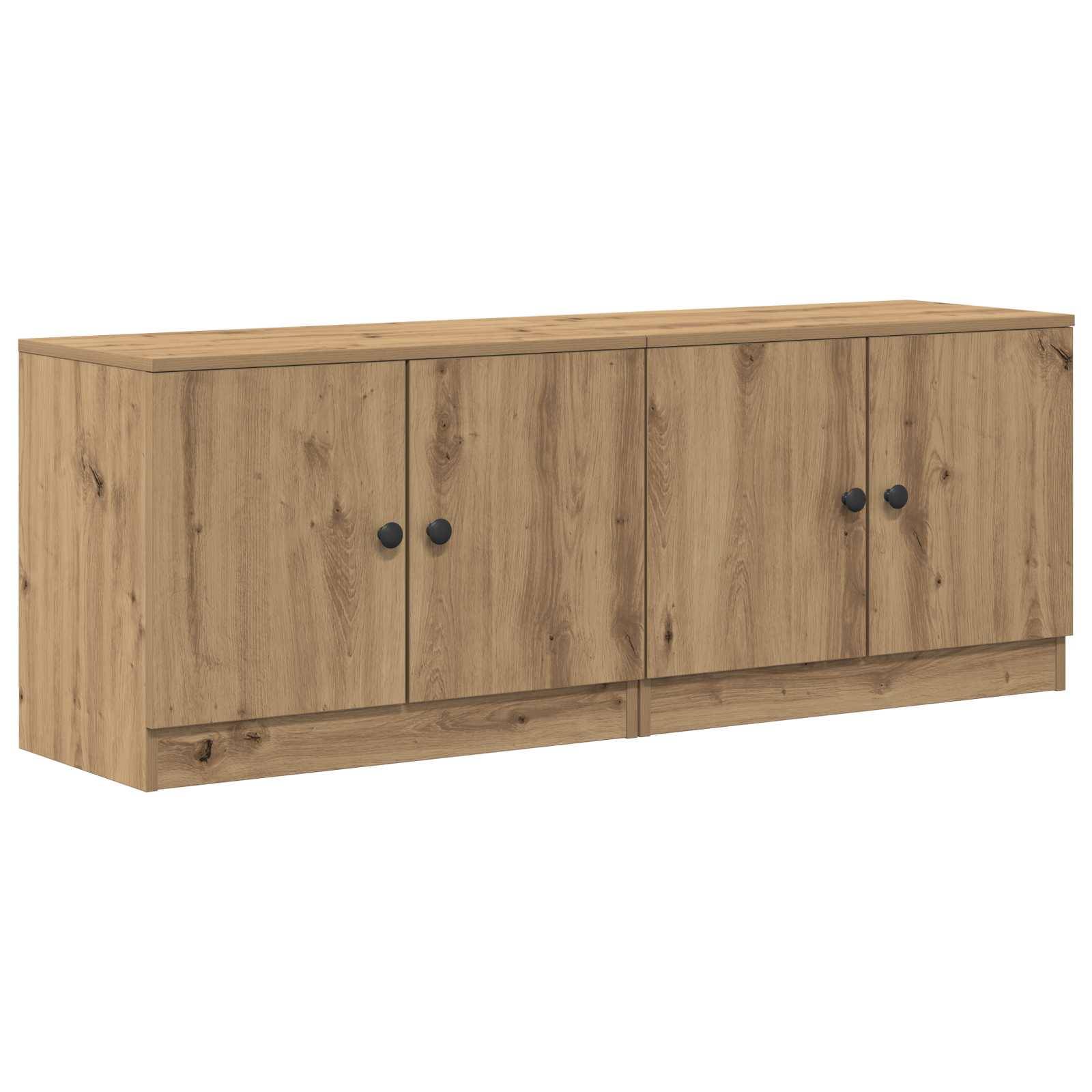 Holzschrank mit vier Türen und schwarzen runden Griffen, vor weißem Hintergrund abgebildet.