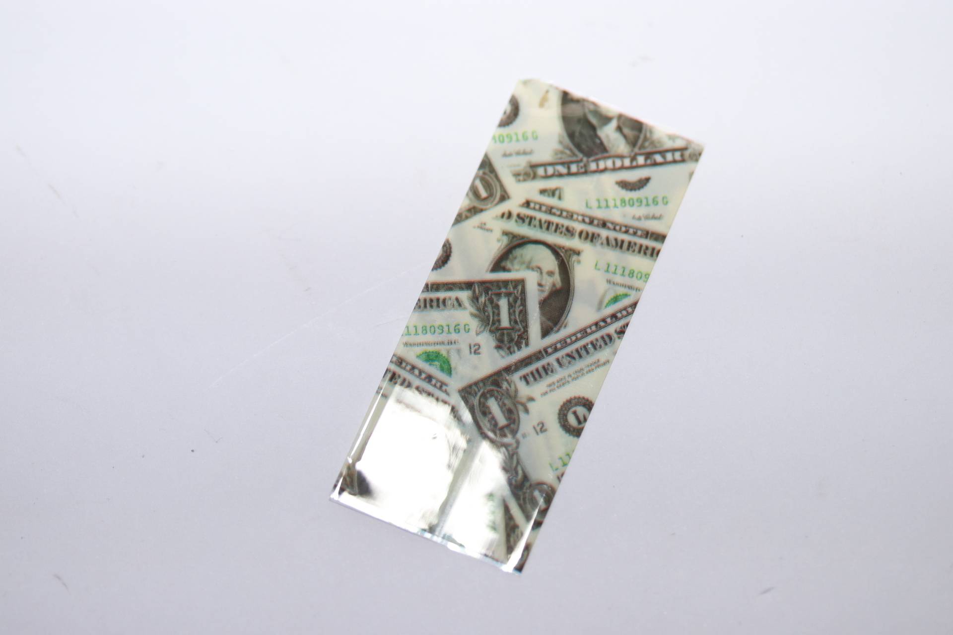 Schrumpfschlauch - Cartoon-Motiv "Dollar" für 18650 Zellen - 70 x 30mm