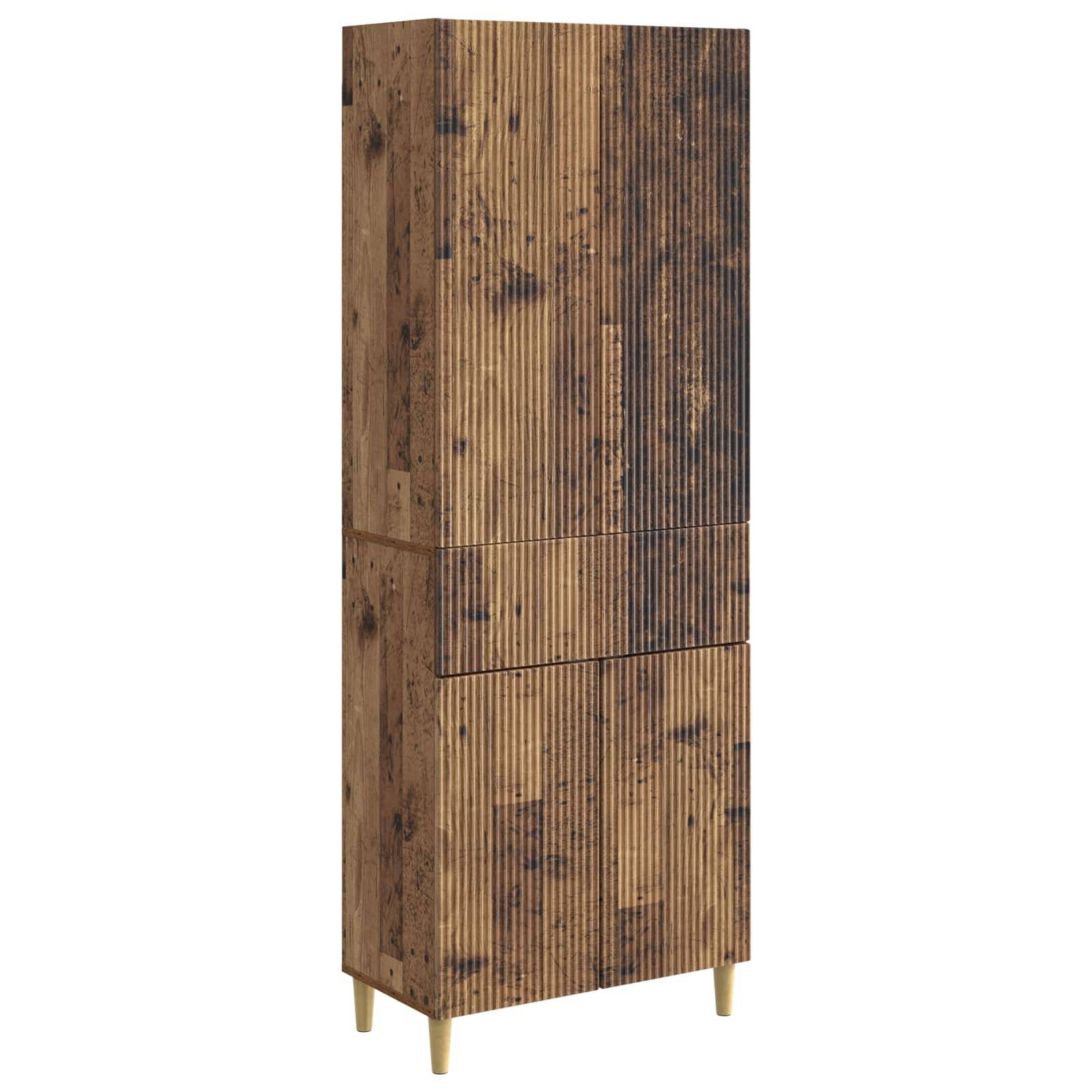 Hoher Holzschrank mit gerippten Frontpaneelen, dunkle Holzmaserung und vier schlanke goldene Beine.