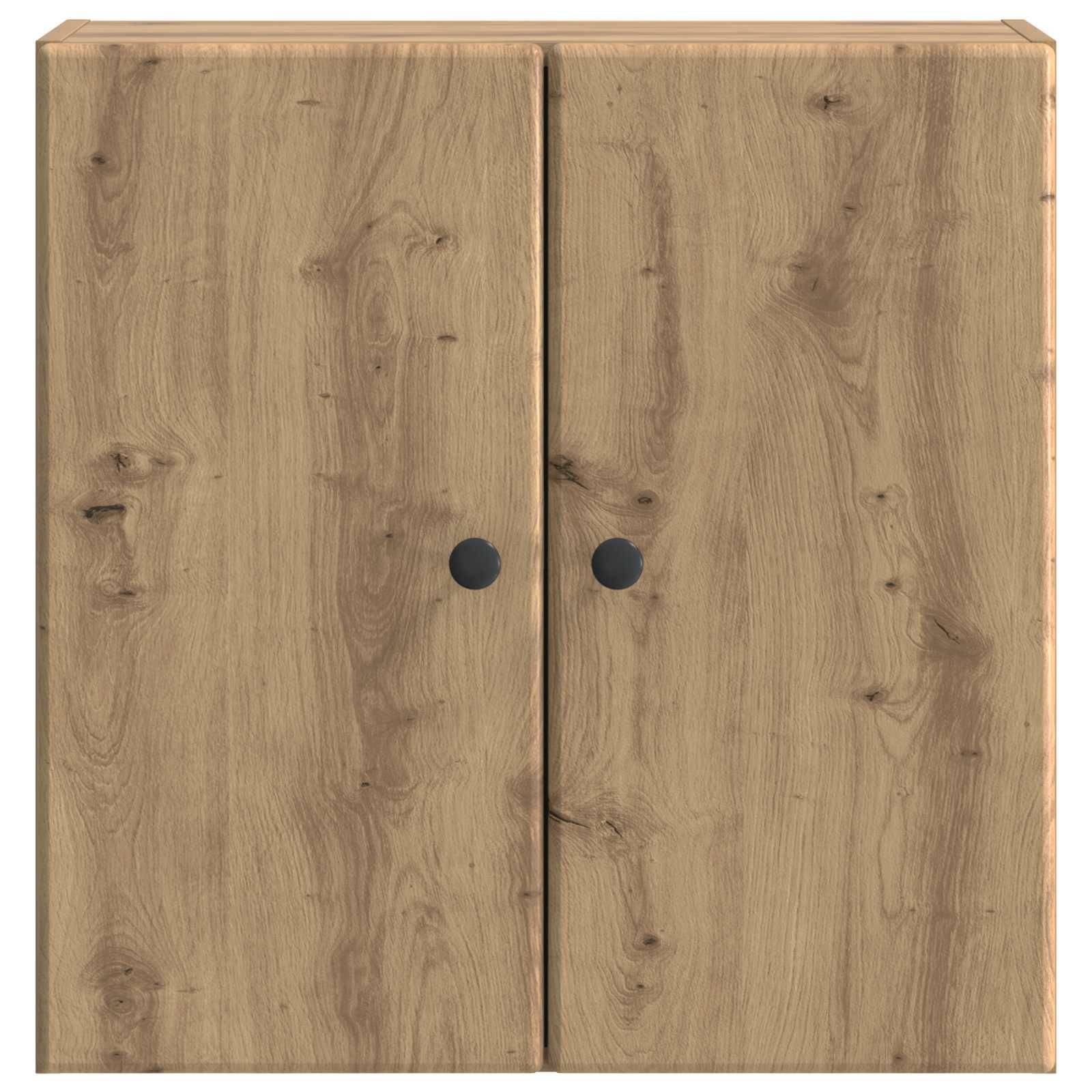 Holzschrank mit zwei Türen und runden schwarzen Knöpfen, geschlossen vor einem einfachen Hintergrund gezeigt.