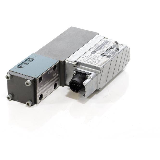 Zwei nebeneinander verbundene industrielle Metall-Elektronikmodule mit einem kreisförmigen Multi-Pin-Stecker auf der rechten Einheit.