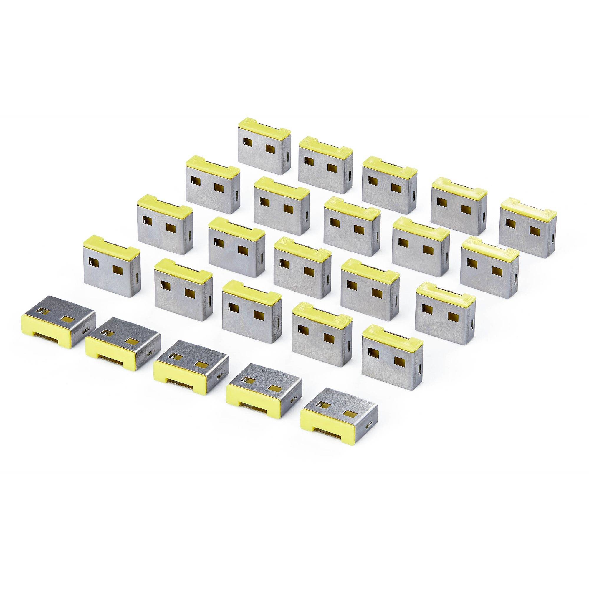Array von kleinen rechteckigen elektronischen Komponenten mit gelbem und silbernem Gehäuse, angeordnet in Reihen auf weißem Hintergrund.