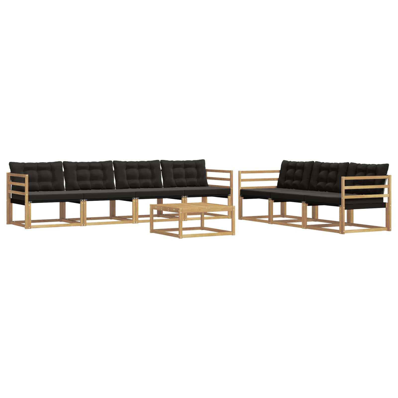 Modulares Garten-Sitzmöbel-Set im Freien mit schwarzen Kissen und hellem Holzrahmen, bestehend aus zwei Ecksessel-Teilen und einem niedrigen passenden Couchtisch.