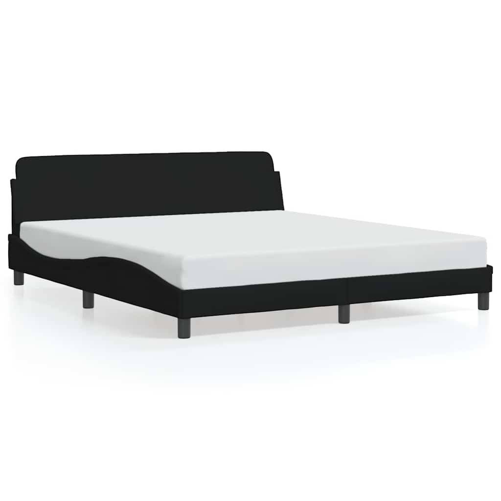 Schwarzes gepolstertes Plattformbett mit geschwungenen Seitenschienen und einer weißen Matratze auf einfachem weißem Hintergrund.
