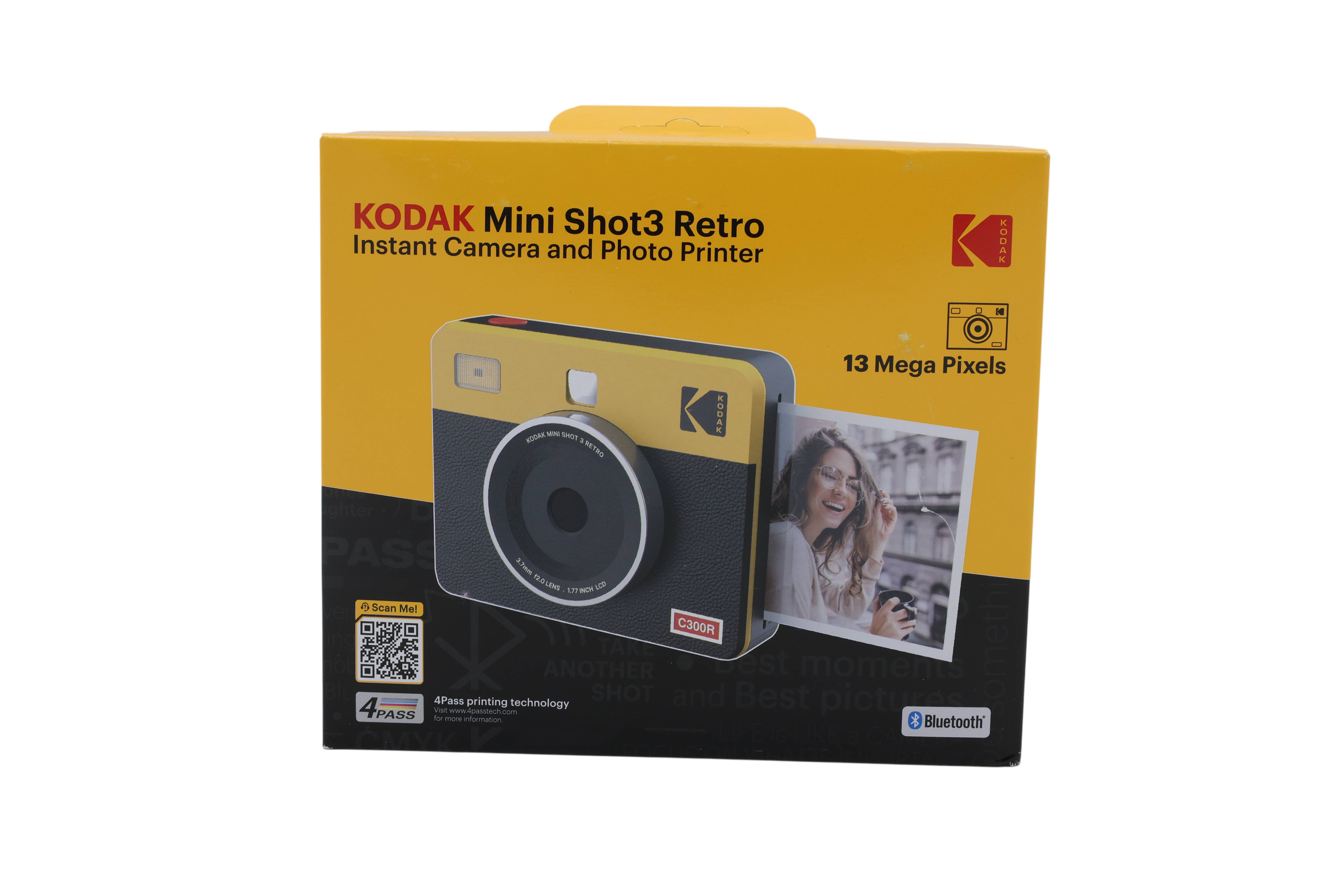 Verpackung für Kodak Mini Shot3 Retro Sofortbildkamera und Fotodrucker, zeigt die Kamera, 13 Megapixel und Bluetooth.