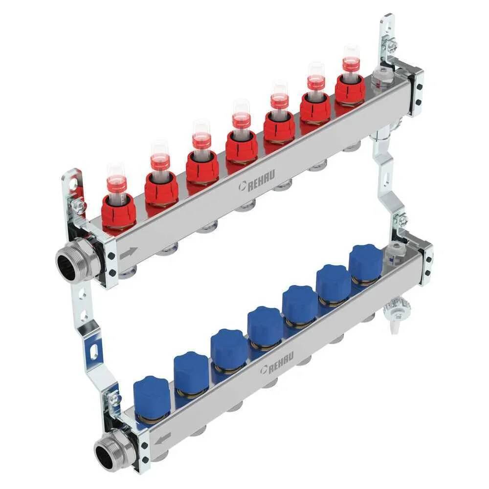 Zweireihen-Verteiler mit acht roten und fünf blauen Ventilen mit Kappen, verwendet zur Verteilung und Kontrolle des Flüssigkeitsflusses.