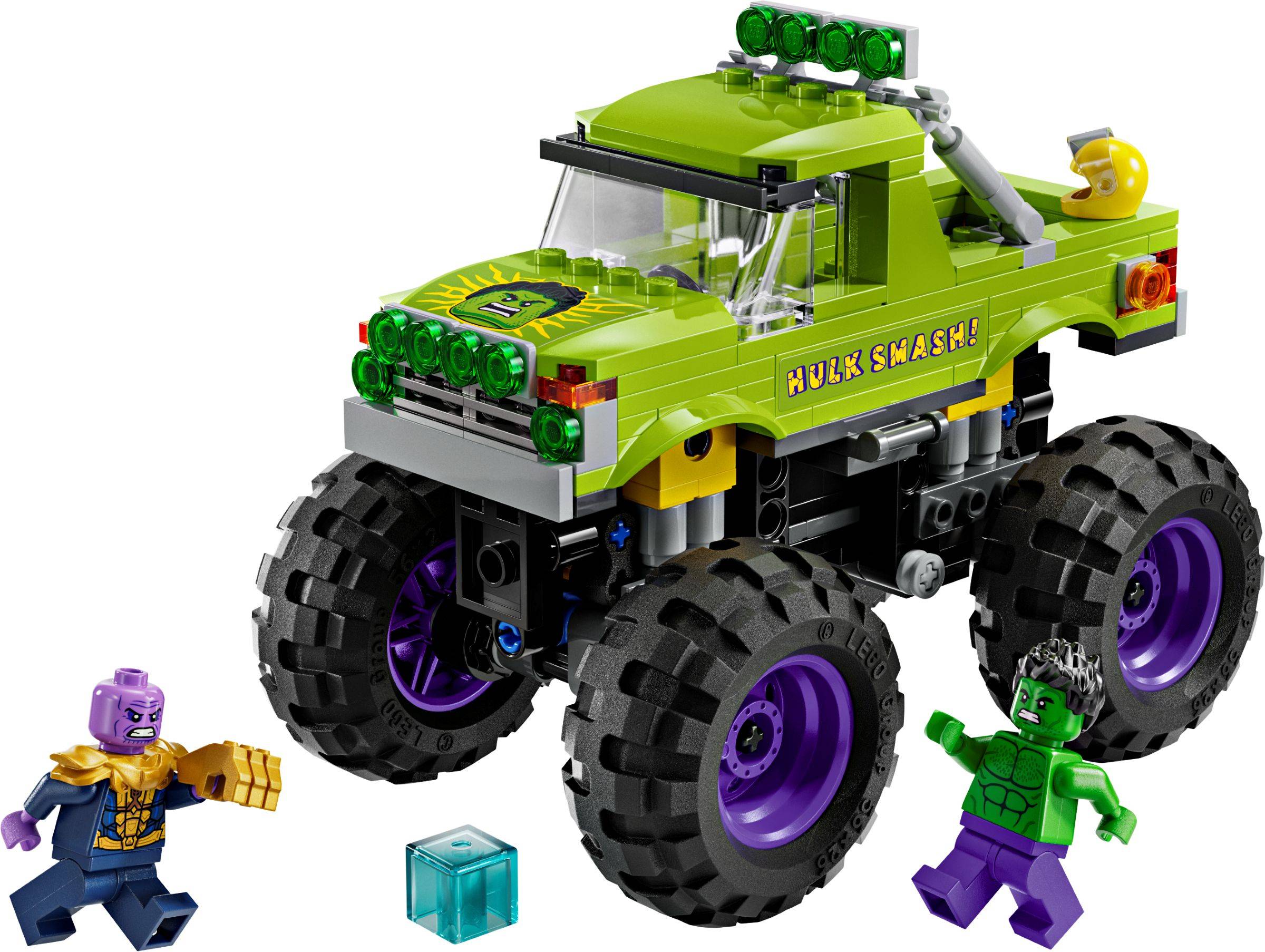 Grüner Hulk Smash Monster Truck Spielzeug mit großen Rädern, gezeigt mit Thanos und Hulk Minifiguren und einem kleinen durchscheinenden blauen Stein.