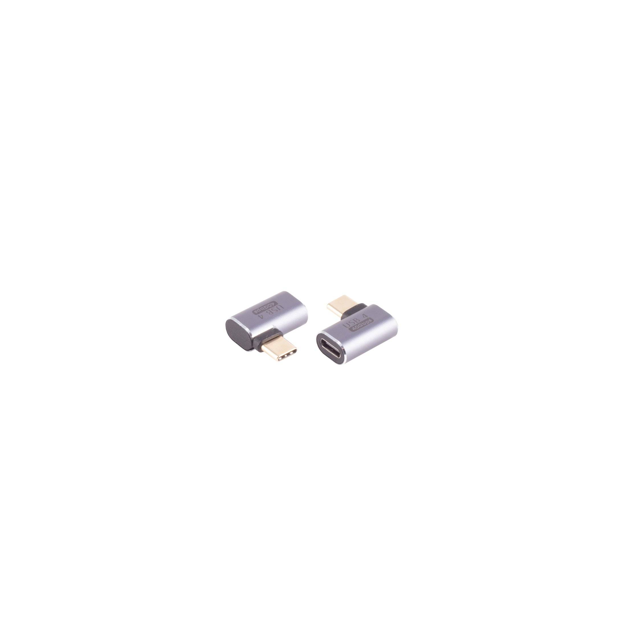 Zwei kleine silberne Adapter-Stecker, einer mit USB-C-Stecker und der andere mit USB-C-Anschluss, auf weißem Hintergrund.
