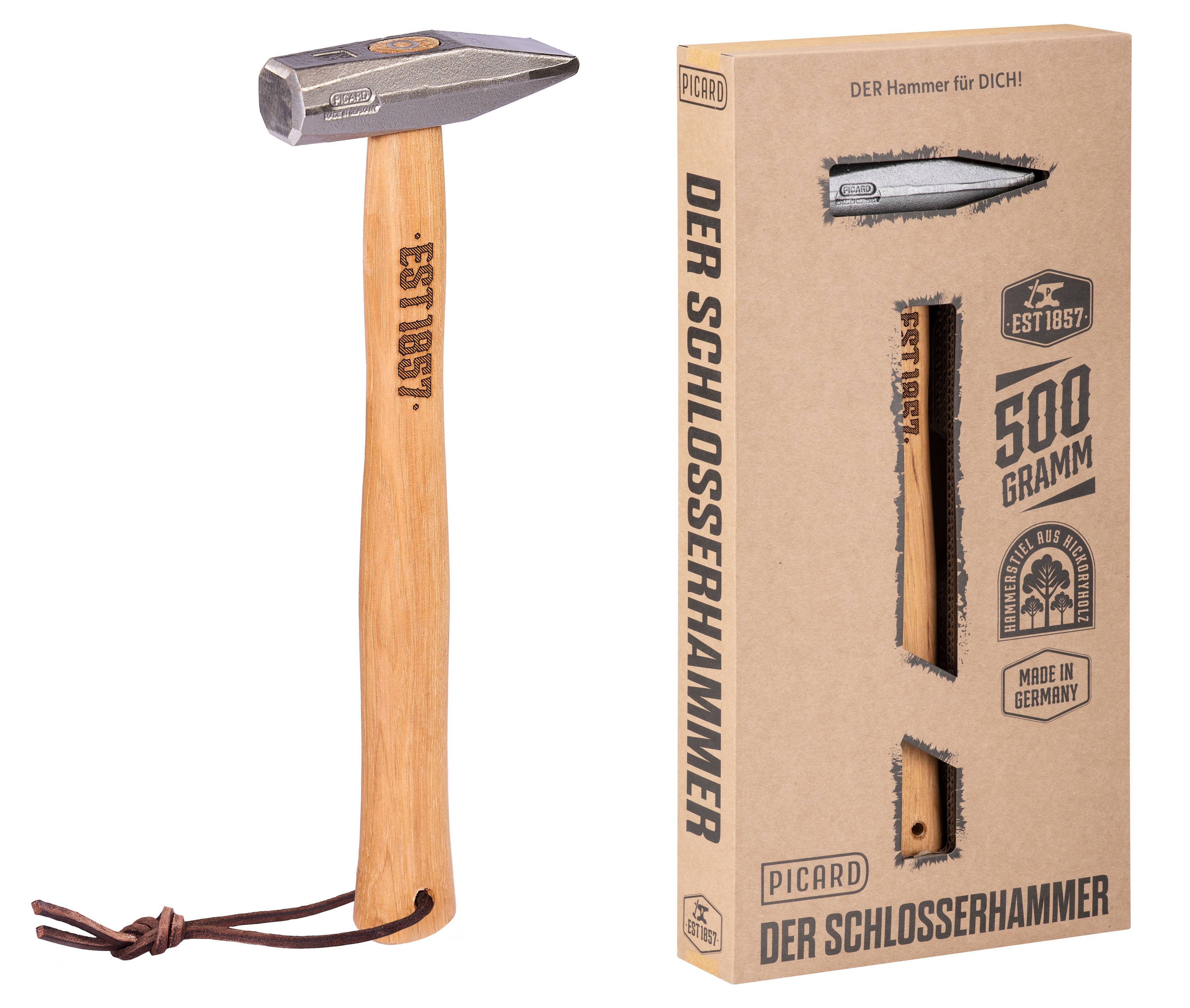 Ein Hammer und seine Kartonverpackung mit den Aufschriften „Der Schlosserhammer