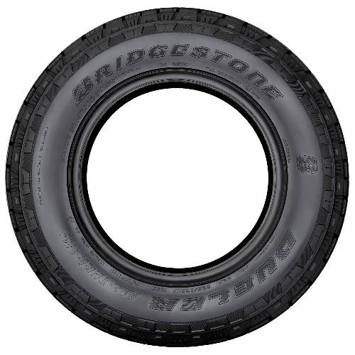 Ein schwarzer Bridgestone-Reifen von oben fotografiert, wobei das „BRIDGESTONE