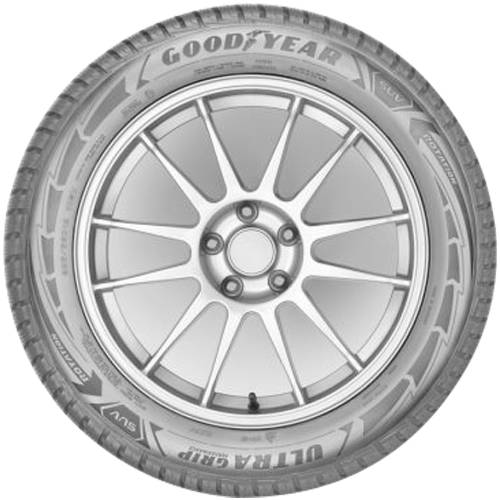Nahaufnahme eines Autoreifens mit silbernem Mehrfachspeichhenfelgen und Goodyear-Reifen vor neutralem Hintergrund.