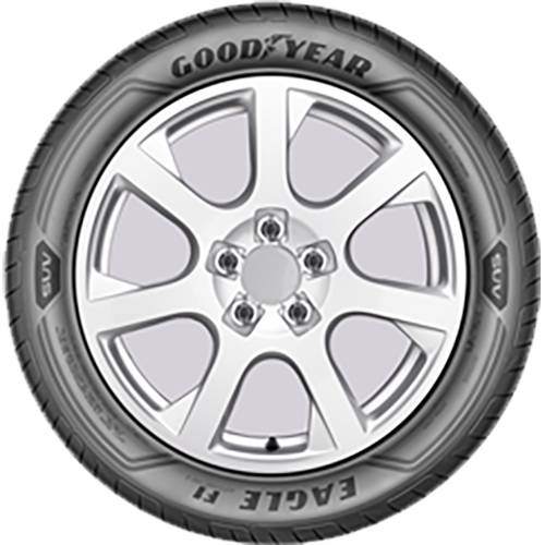 Silbernes fünfspeichiges Autorad mit Goodyear Eagle F1-Reifen, frontal auf schwarzem Hintergrund dargestellt.