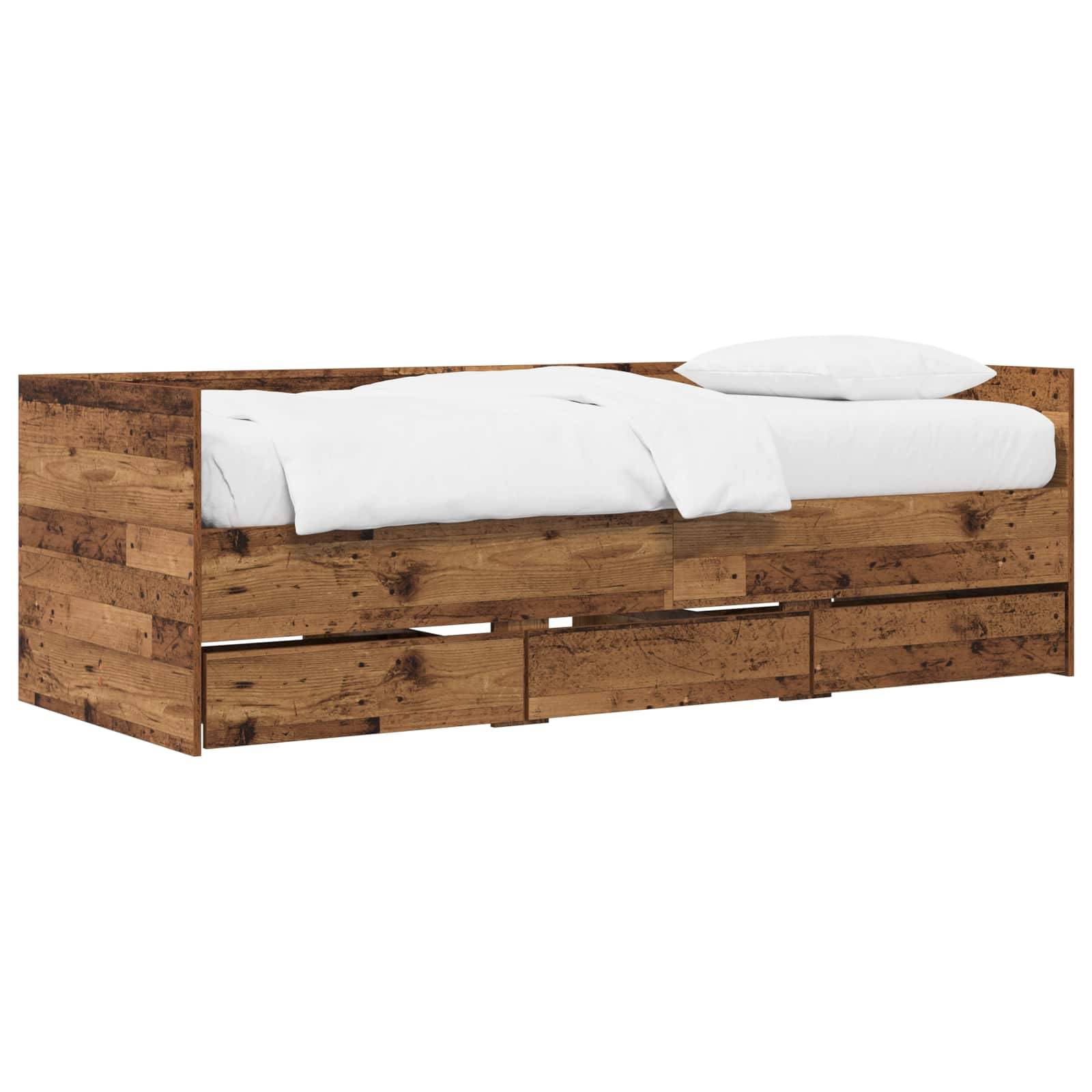 Holzbett mit Stauraum, weißer Matratze und Kissen, mit drei Schubladen an der Vorderseite unter dem Rahmen.