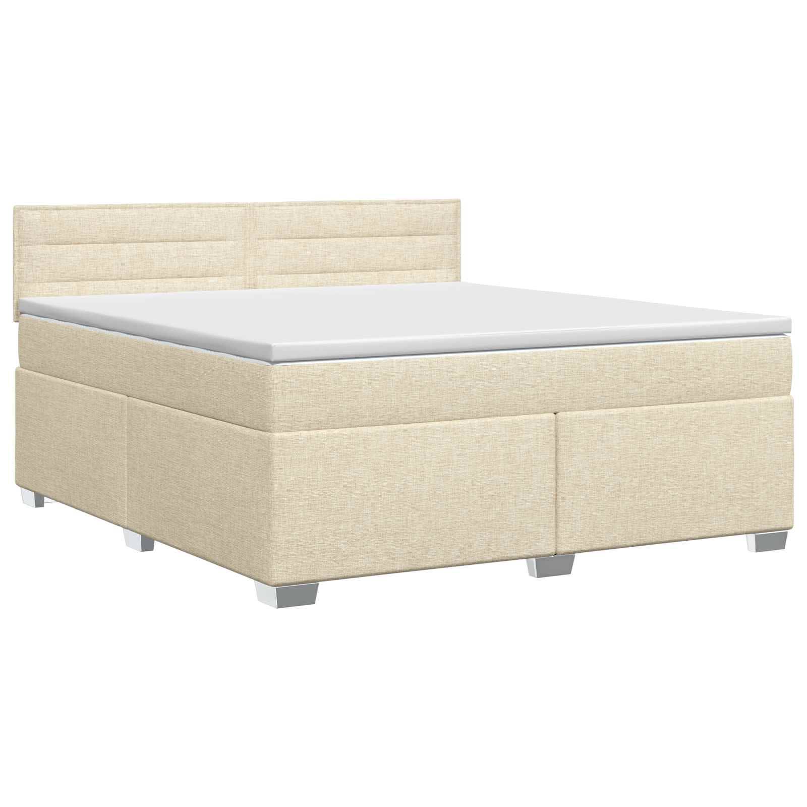 Beige gepolstertes Bett mit einer gepolsterten Kopfstütze und weißer Matratze auf sauberem weißem Hintergrund.