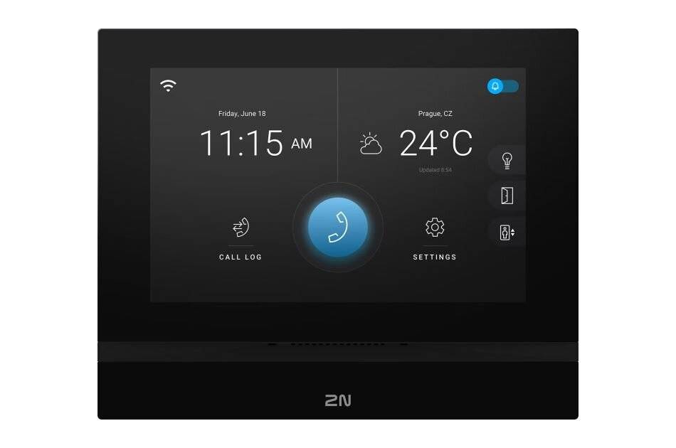 Ein schwarzes, an der Wand montiertes Touchscreen-Gegensprechanlage-Display zeigt die Uhrzeit 11:15 Uhr, das Datum Freitag, 18. Juni, Prag 24°C und Symbole für Anrufliste und Einstellungen an.