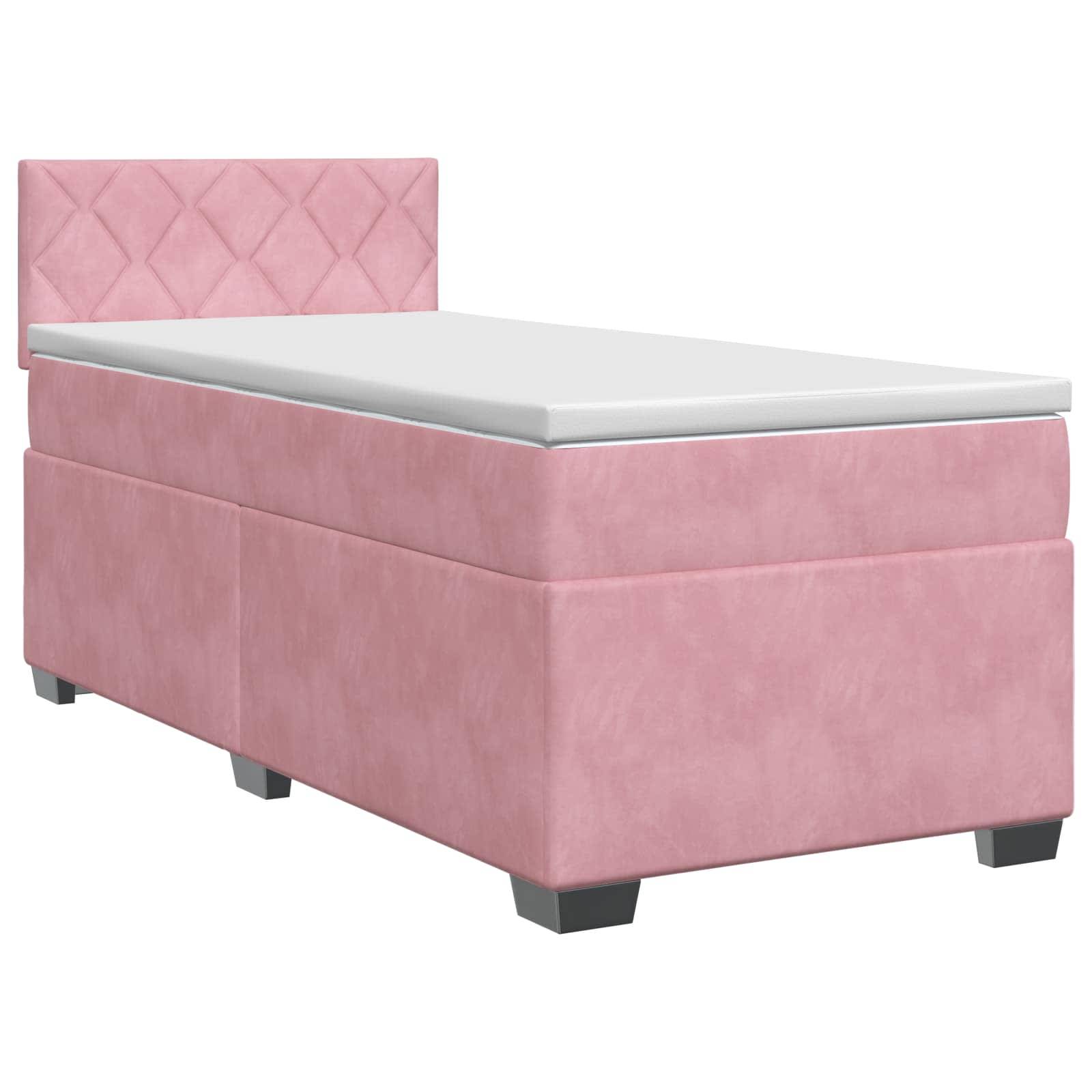 Rosa gepolstertes Einzelbett mit gestepptem Kopfteil, weiße Matratze und dunkle Beine auf weißem Hintergrund.
