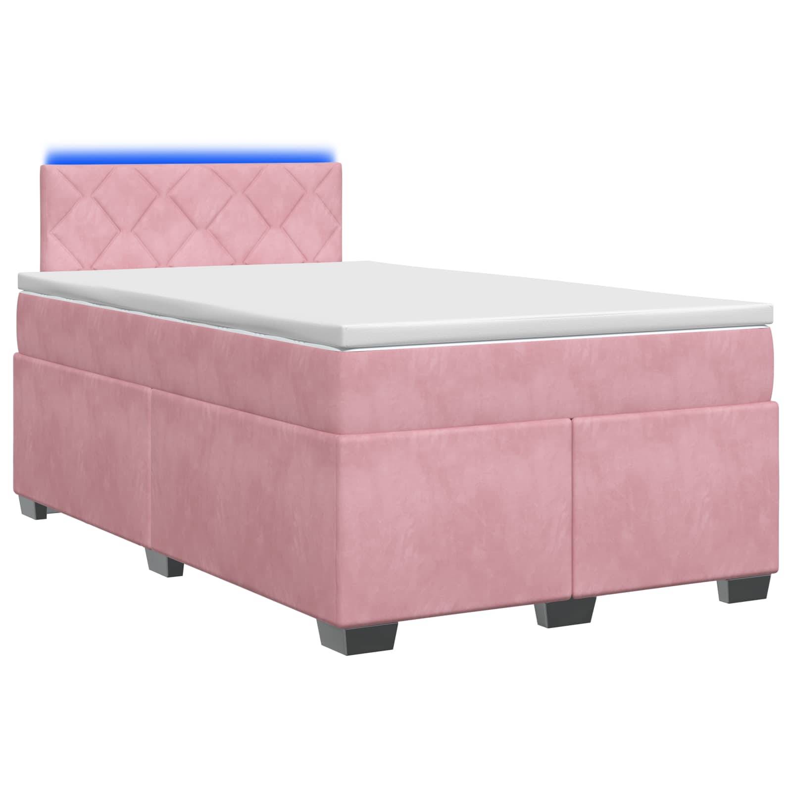 Rosa gepolstertes Einzelbett mit gestepptem Kopfteil und weißer Matratze auf weißem Hintergrund.