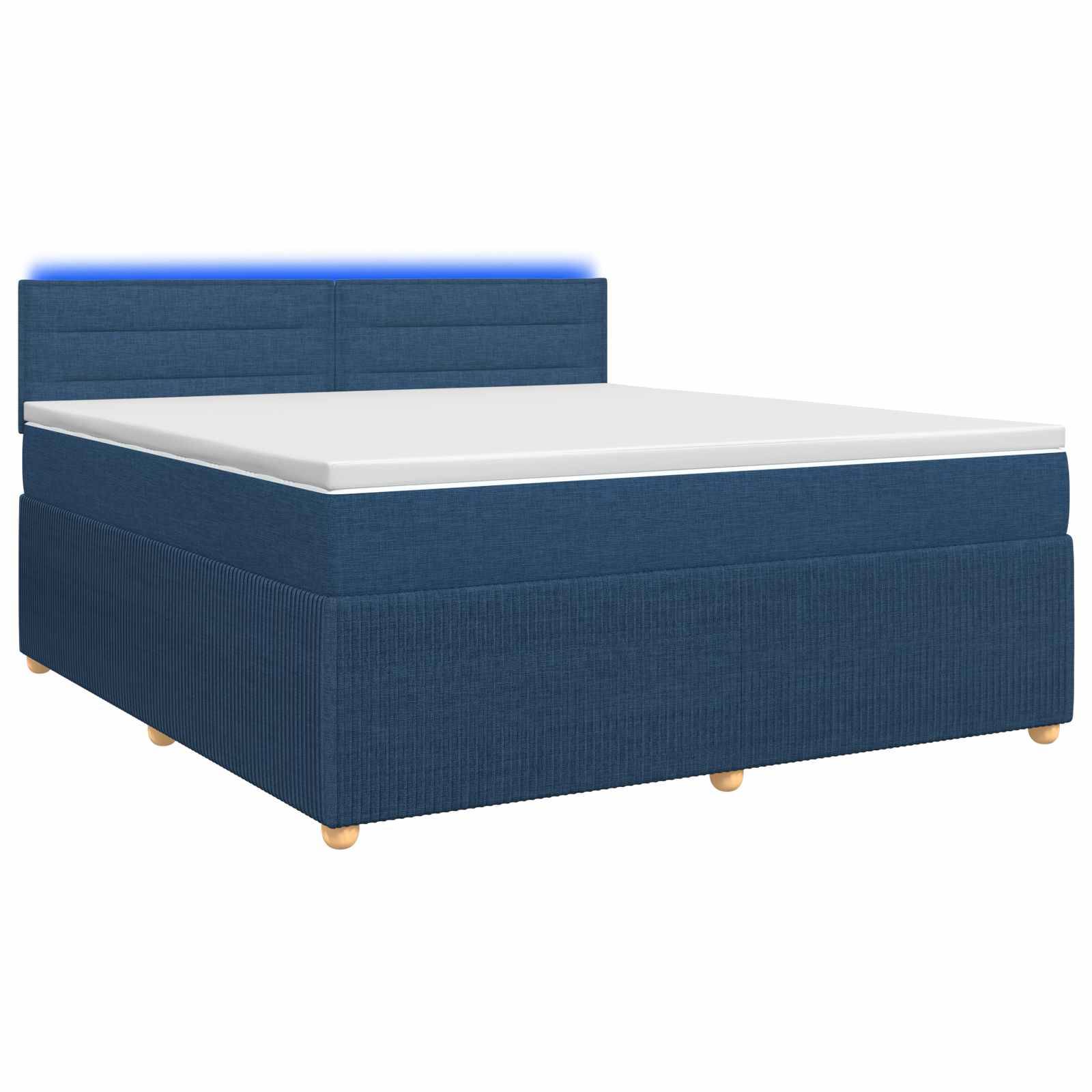 Bett mit blauem Polsterstoff, weißer Matratze und passendem Kopfteil auf einfachem weißem Hintergrund.