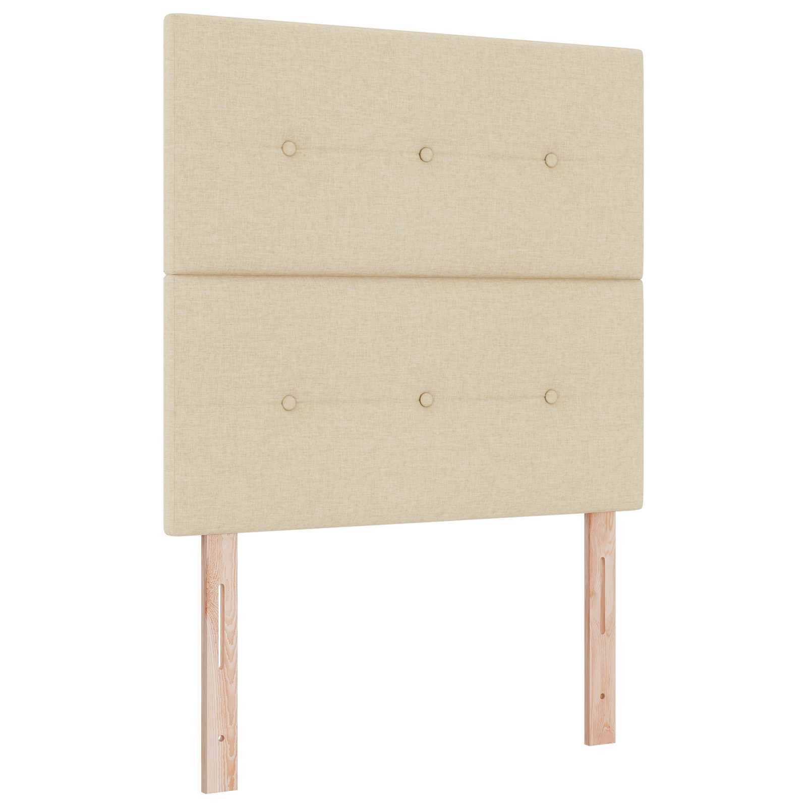 Beige gepolstertes Kopfteil mit zwei gepolsterten Paneelen und Holzbeinen auf weißem Hintergrund.