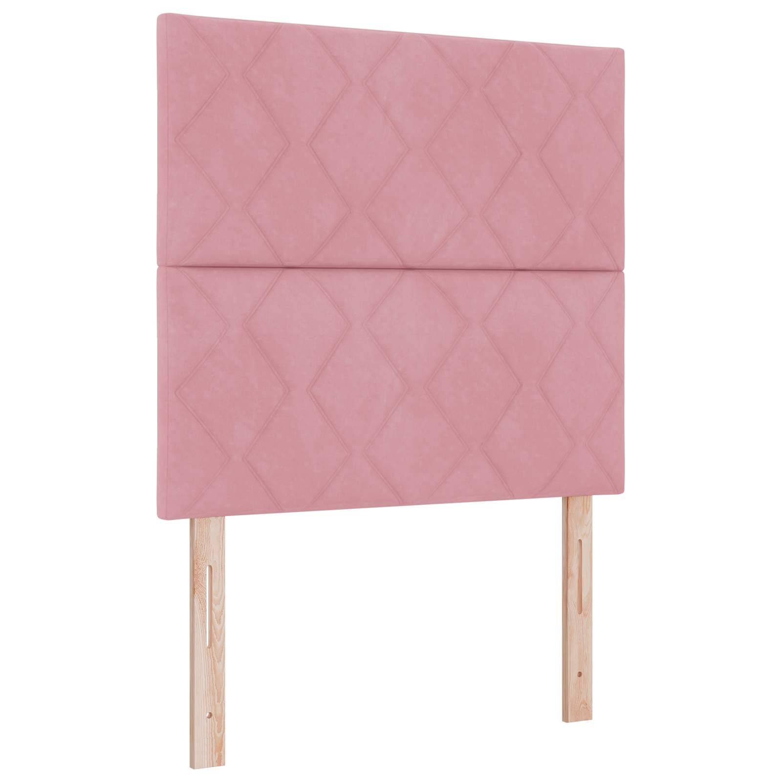 Rosa gepolstertes Kopfteil mit Diamantsteppung und zwei Holzbeinen auf weißem Hintergrund.