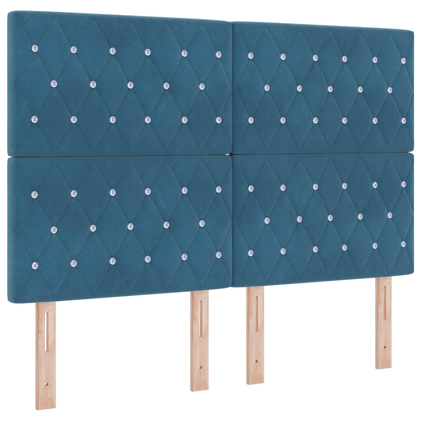 Blaues Kopfteil mit Polsterung, Diamant-Steppung und vier Holzstützbeinen auf weißem Hintergrund.