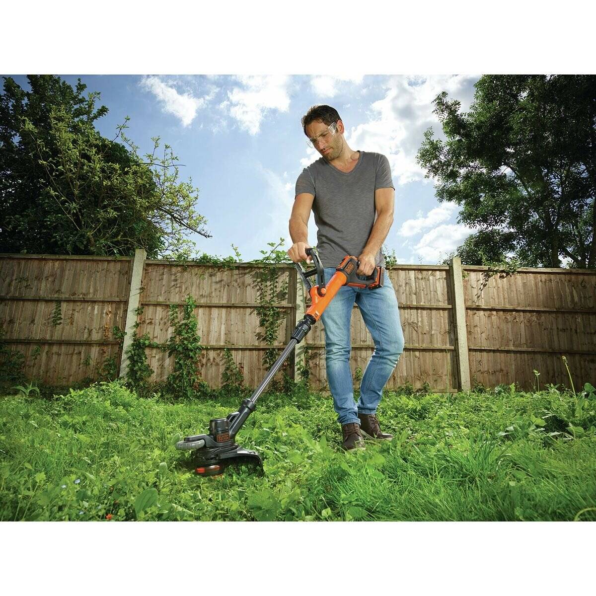 Akku-Rasentrimmer STC1820EPC, 18Volt (orange/schwarz, Li-Ionen Akku 2,0Ah)