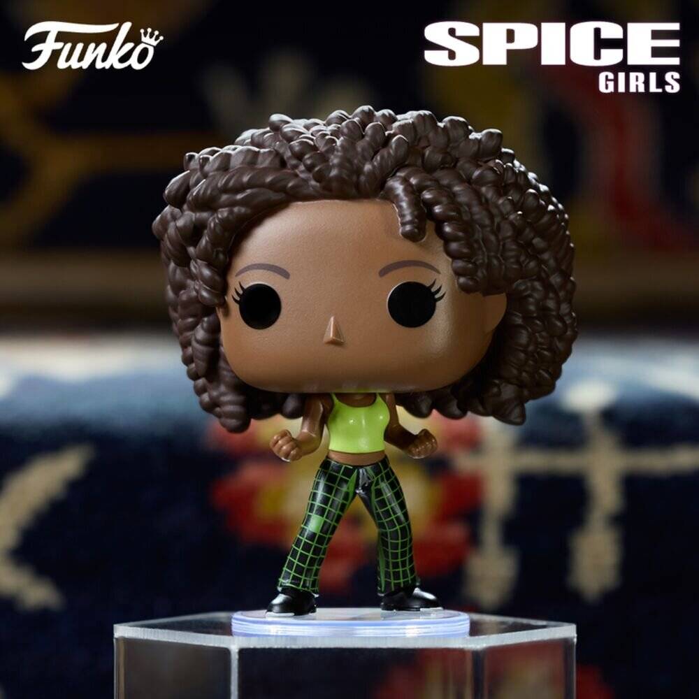 Funko Pop Figur eines Spice Girls Mitglieds mit lockigem Haar, Lime-Top und karierten Hosen, stehend auf einer transparenten Displaybasis.