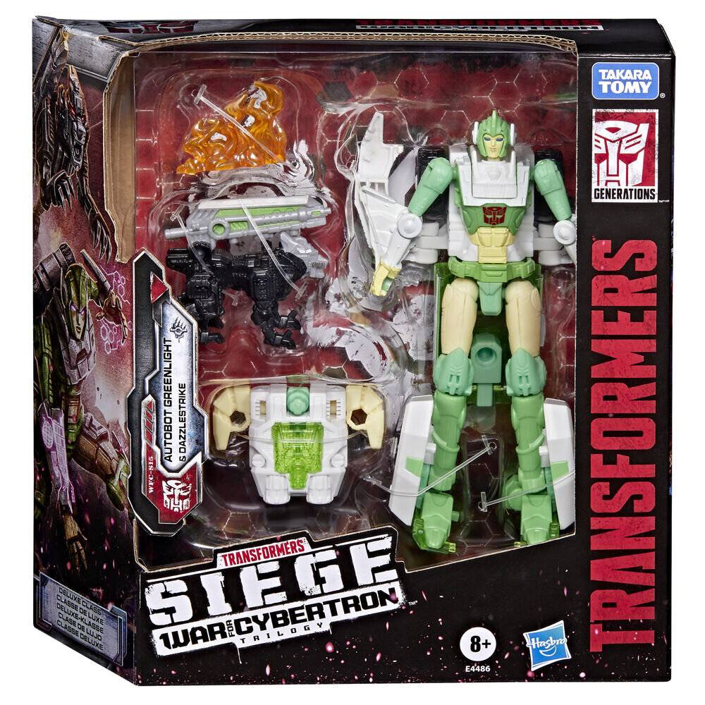 Transformers Generations Spielzeugkarton mit Autobot Greenlight und Dazzlestrike Figuren in Fensterverpackung aus Siege War for Cybertron Trilogy.