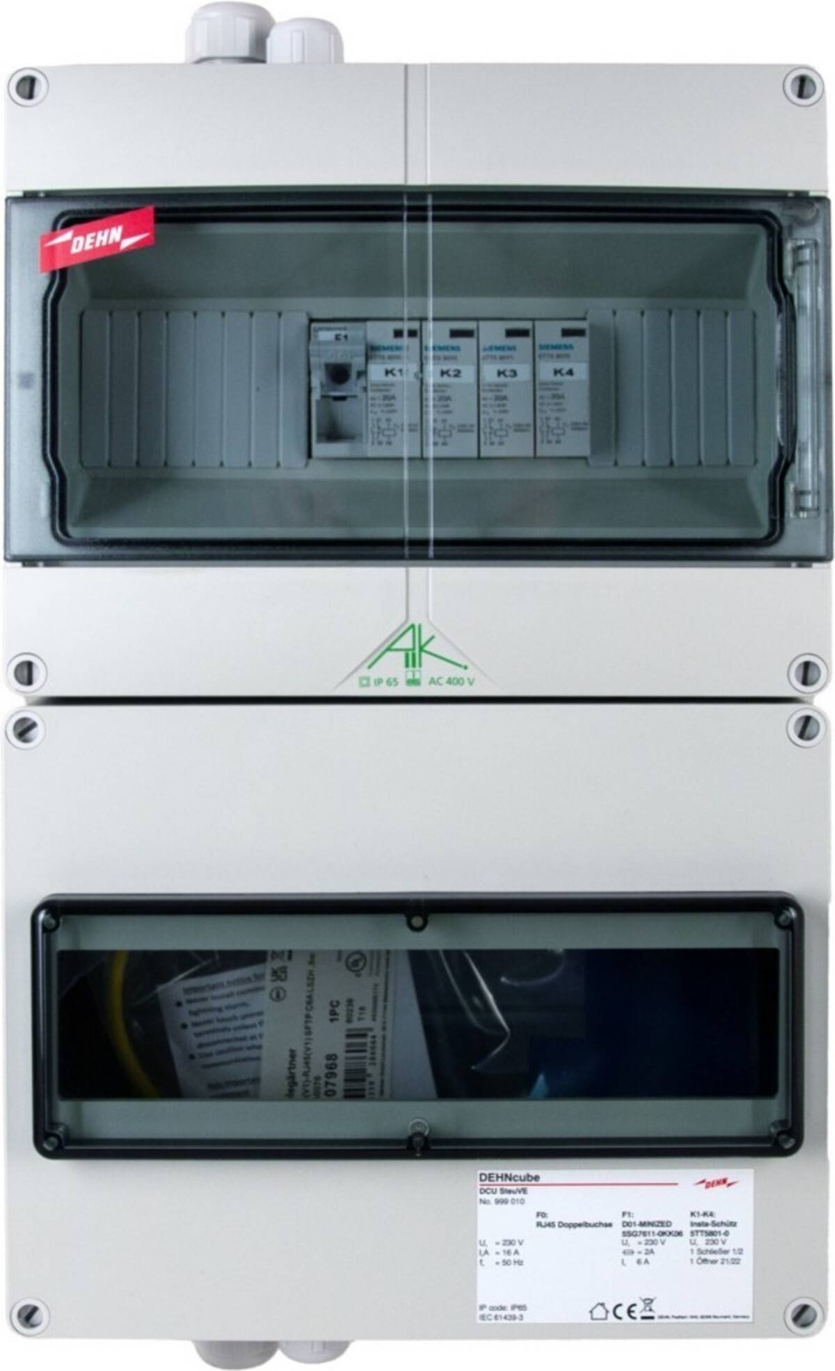Elektrischer Schaltschrank mit zwei klaren Inspektionsfenstern, die installierte Schutzschalter und Verkabelung zeigen.