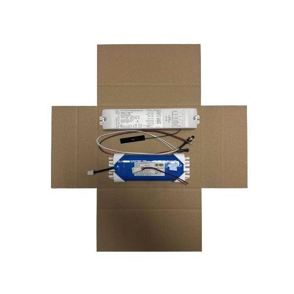 Kartonverpackung in Kreuzform mit zwei elektronischen Vorschaltgeräten oder Stromversorgungen und angebrachten Kabeln, die in der Mitte angeordnet sind.