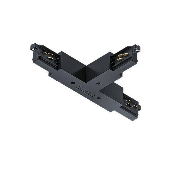 Schwarzer X-förmiger Gleisbeleuchtungsstecker mit vier elektrischen Enden auf weißem Hintergrund.