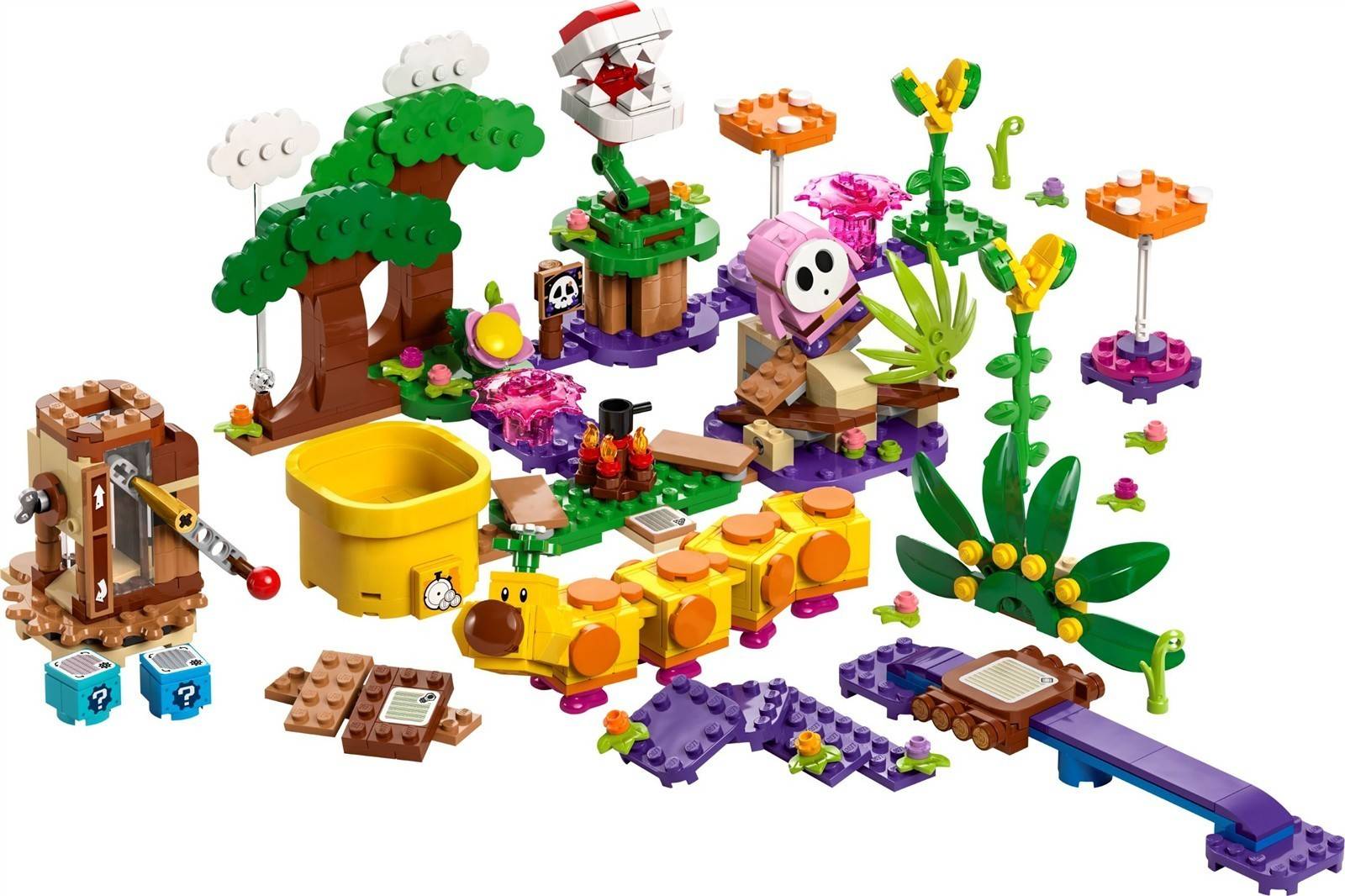 LEGO-ähnliches Spielzeug-Bauset mit einem Baum, Blumen, Pilzen, Ranken, kleinen Figuren und farbenfrohen modularen Plattformen, die auf einem weißen Hintergrund verstreut sind