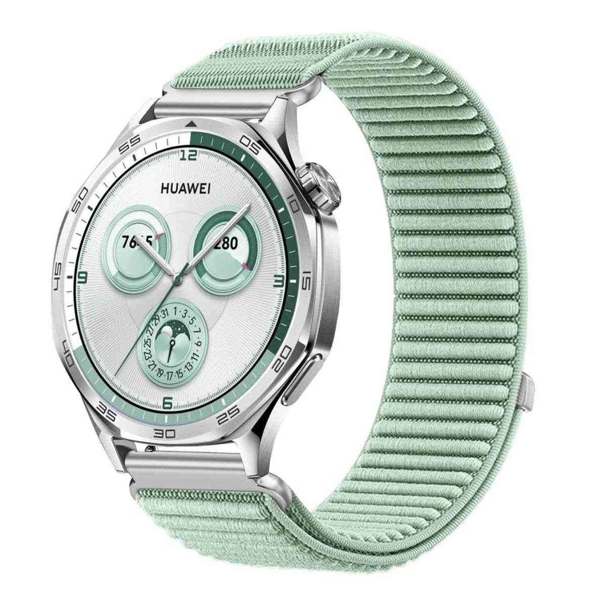 Mintgrüne Huawei-Smartwatch mit rundem Silbergehäuse und Stoffarmband, mit analogem Zifferblatt und drei kleinen Hilfszifferblättern.