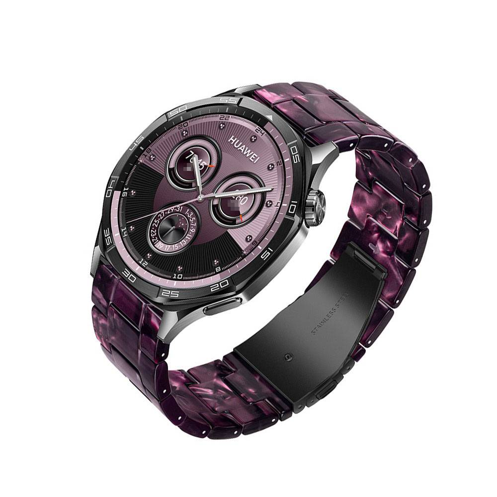 Lila Huawei-Armbanduhr mit analogem Zifferblatt und verbundenem Metallarmband auf weißem Hintergrund.