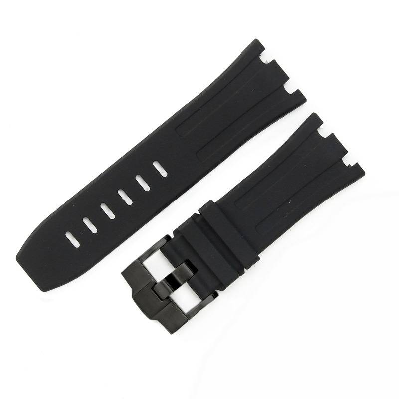 Schwarzes Gummi-Uhrenarmband mit silberner Schließe, in zwei Teilen auf weißem Hintergrund dargestellt.