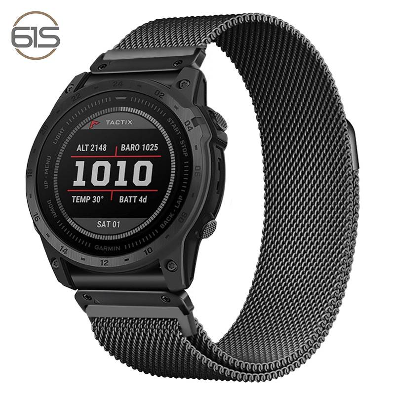 Schwarze Garmin Tactix Smartwatch mit Mesh-Metallband, zeigt digitales Zifferblatt mit Höhe, Barometer, Temperatur, Akku und Datum.
