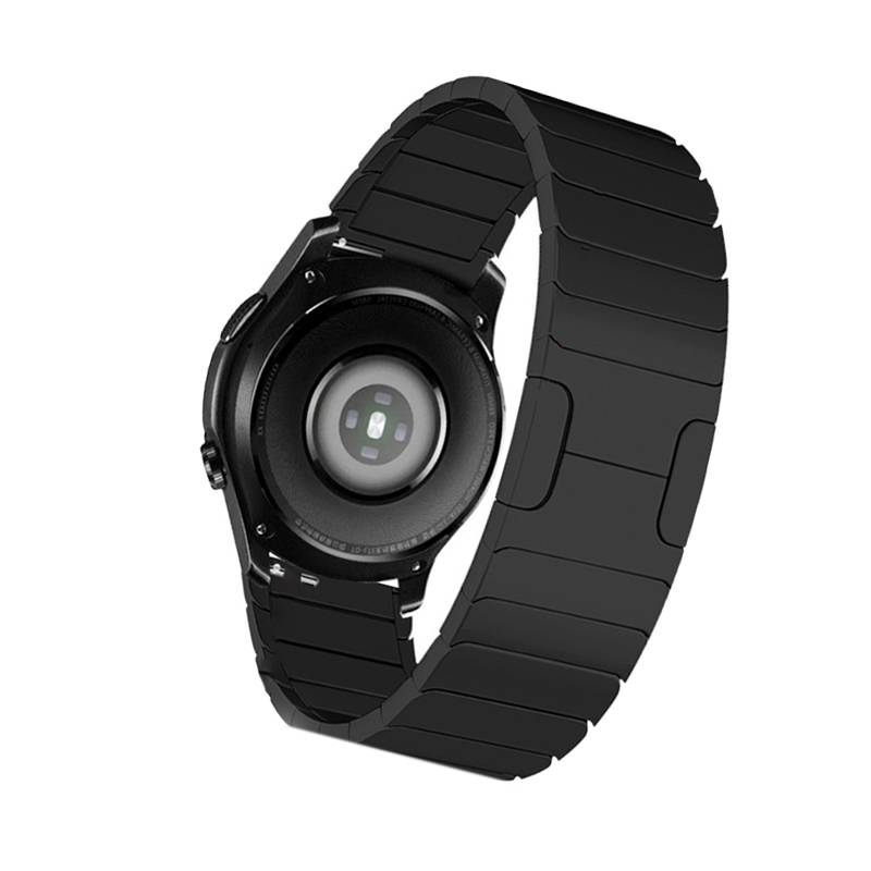 Schwarze Smartwatch von hinten gezeigt, wobei der kreisförmige Sensor und das segmentierte Band auf weißem Hintergrund hervorgehoben werden.