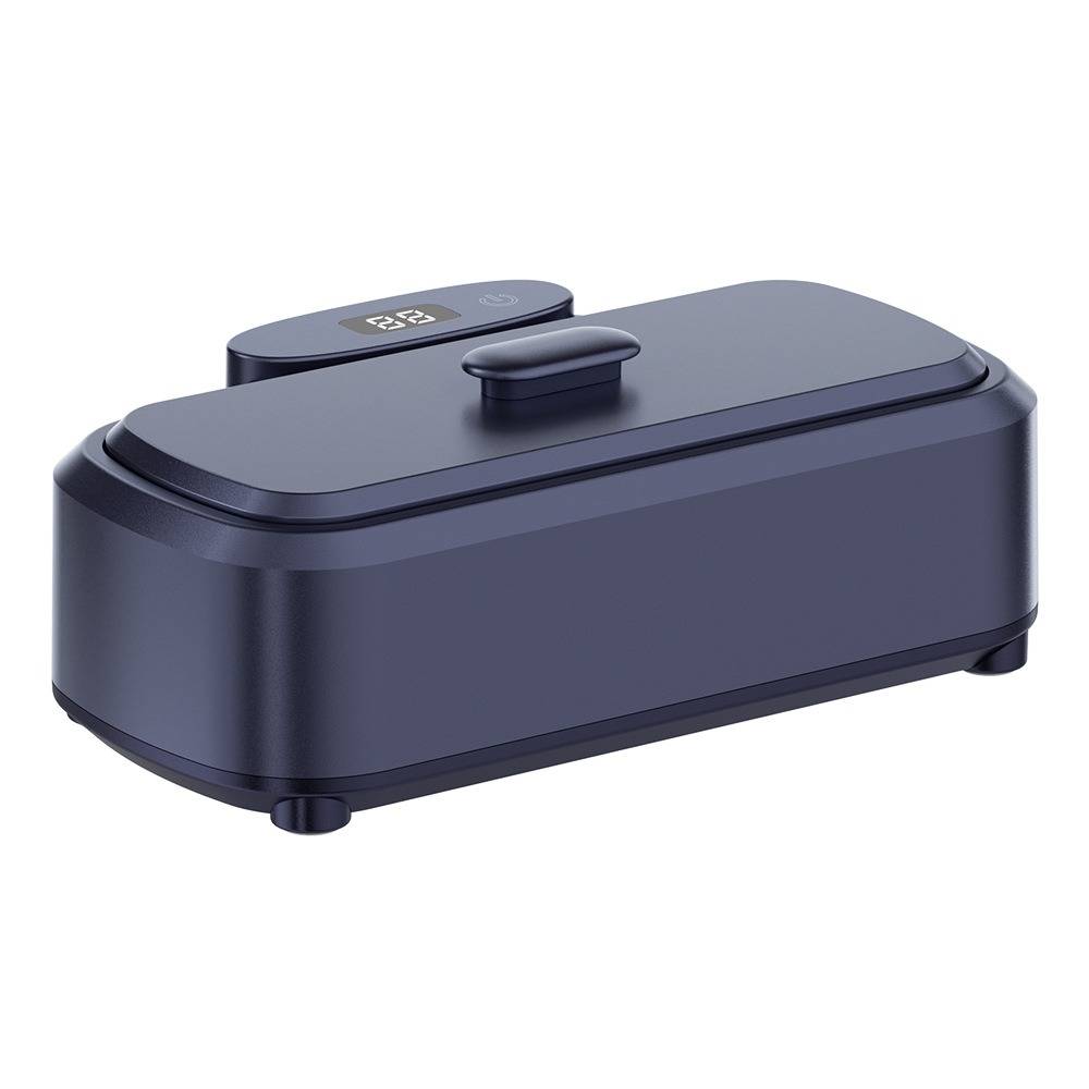 Eine dunkelgraue rechteckige elektrische Lunchbox oder Essenwärmer mit Deckel, Griff und kleinem digitalen Display oben.