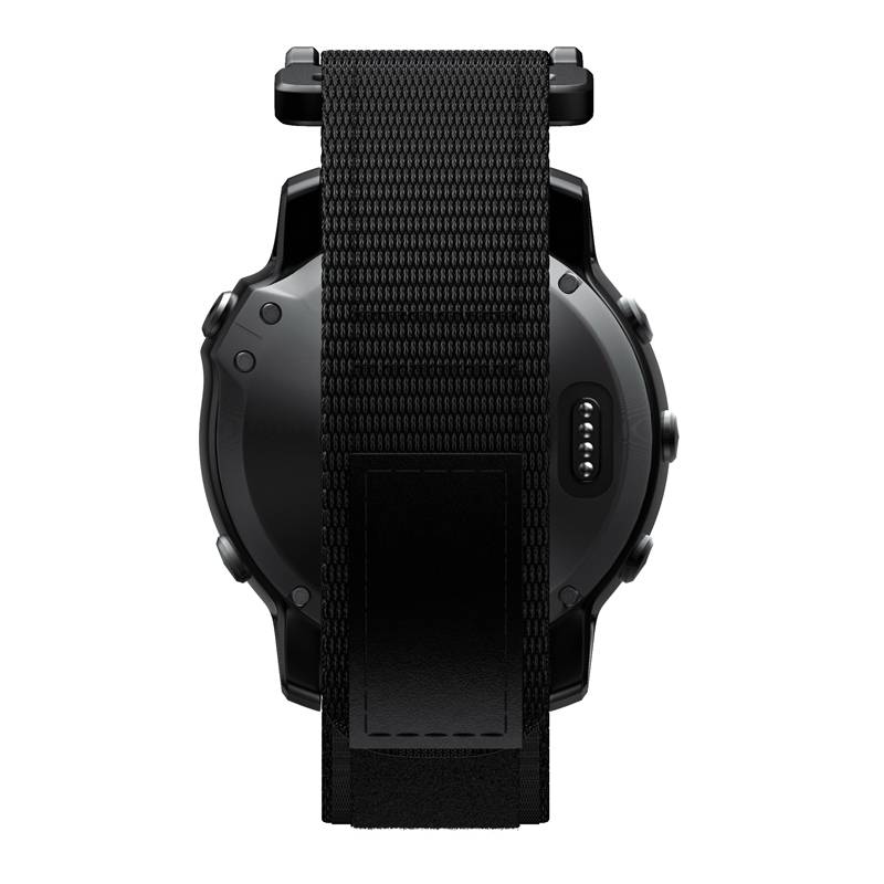 Schwarze Smartwatch von hinten dargestellt mit strukturiertem schwarzem Armband und Ladekontakten auf der rechten Seite.