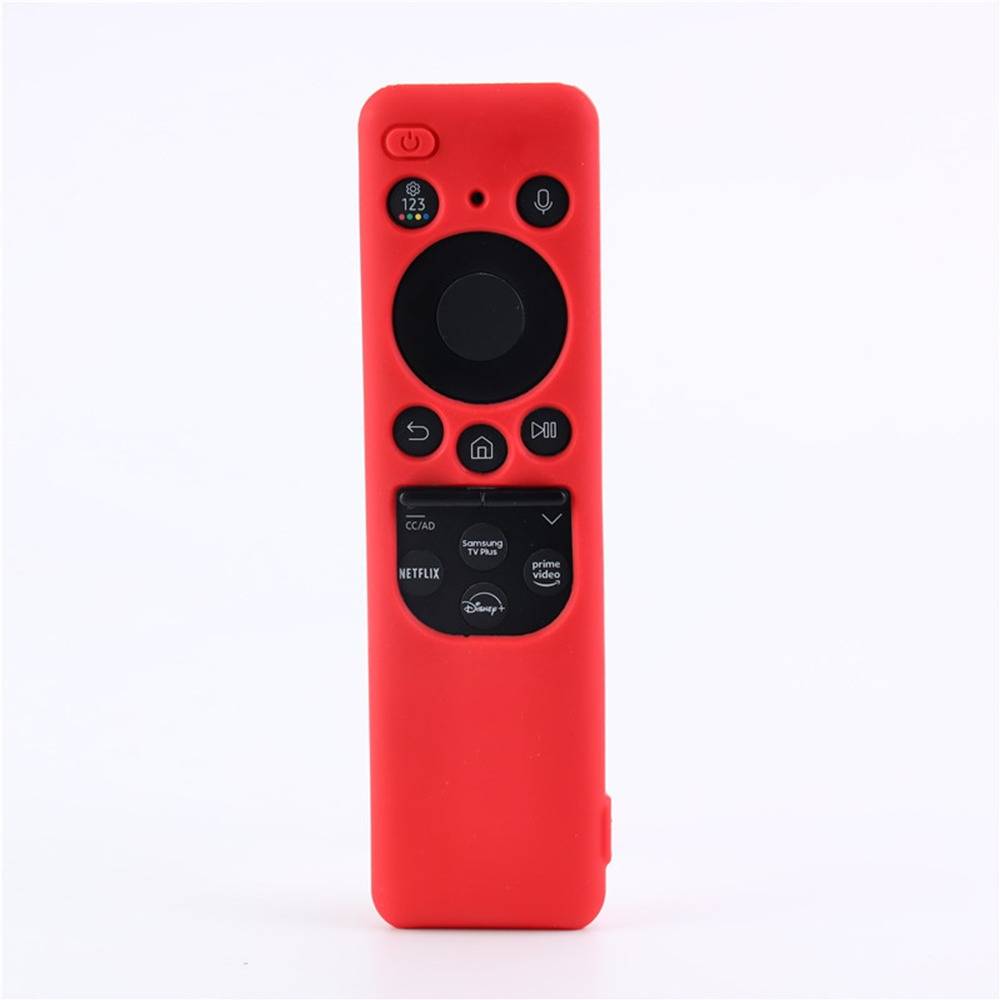 Rote Fernbedienung für Fernseher mit Power-, Sprach-, Navigations-, Home-, Zurück-, Play- und Streaming-App-Tasten auf weißem Hintergrund.