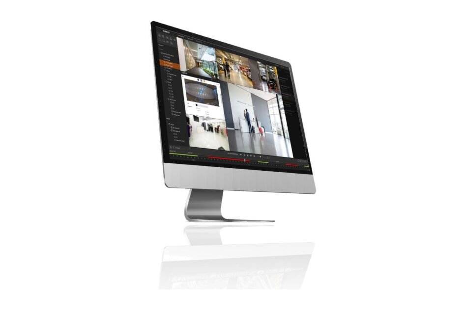 Ein Desktopmonitor, auf dem eine Überwachungs- oder Sicherheitskamera-Überwachungsschnittstelle mit mehreren Live-Videofeeds auf einem dunklen Dashboard angezeigt wird.