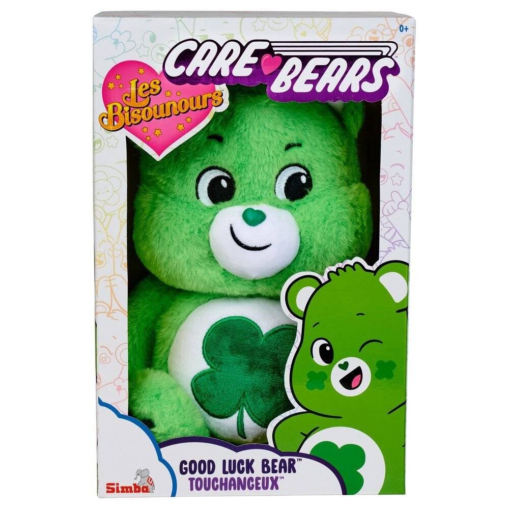 Verpackte grüne Care Bears 'Les Bisounours' Plüschfigur mit der Bezeichnung 'Good Luck Bear Touchenoucex' mit einem Kleeblatt auf dem Bauch.