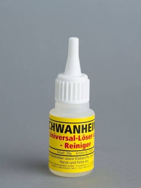Kleine weiße Kunststoffflasche mit spitzer Düse, gekennzeichnet mit „SCHWANHEIM Universall-Löser - Reiniger