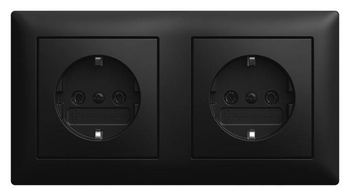 Schwarze Wandplatte mit zwei runden Elektrosteckdosen nebeneinander