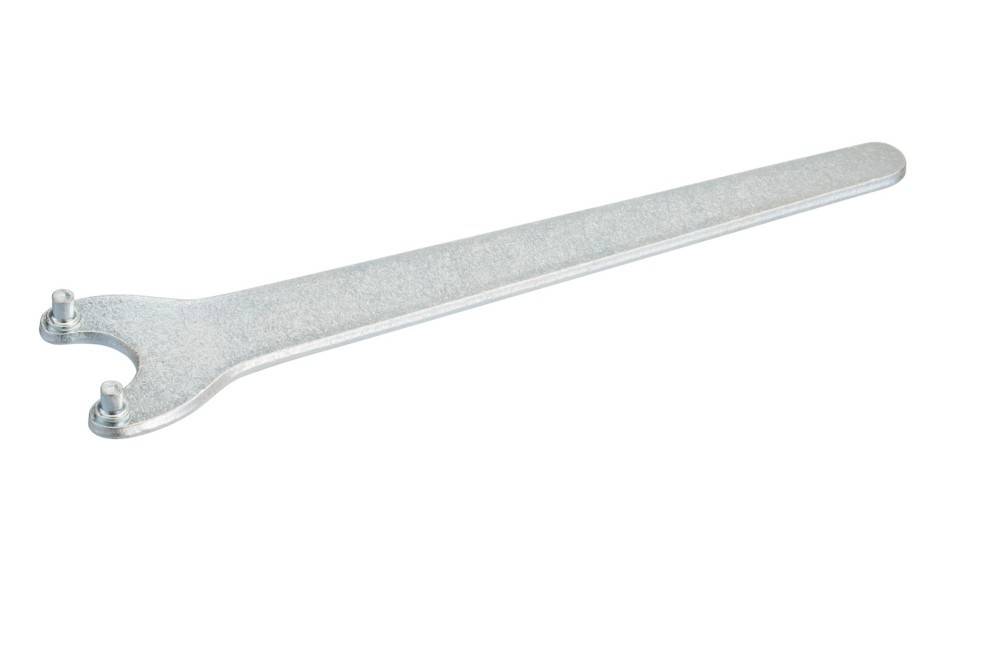 Metallischer Schraubenschlüssel mit U-förmigem Ende und zwei Stiften, dargestellt auf weißem Hintergrund.