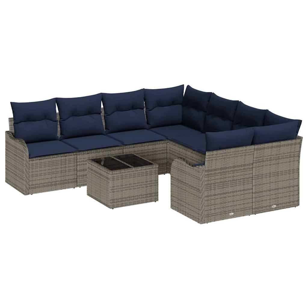 L-förmiges Korb-Außensofa mit marineblauen Kissen und passendem Glastisch auf weißem Hintergrund.