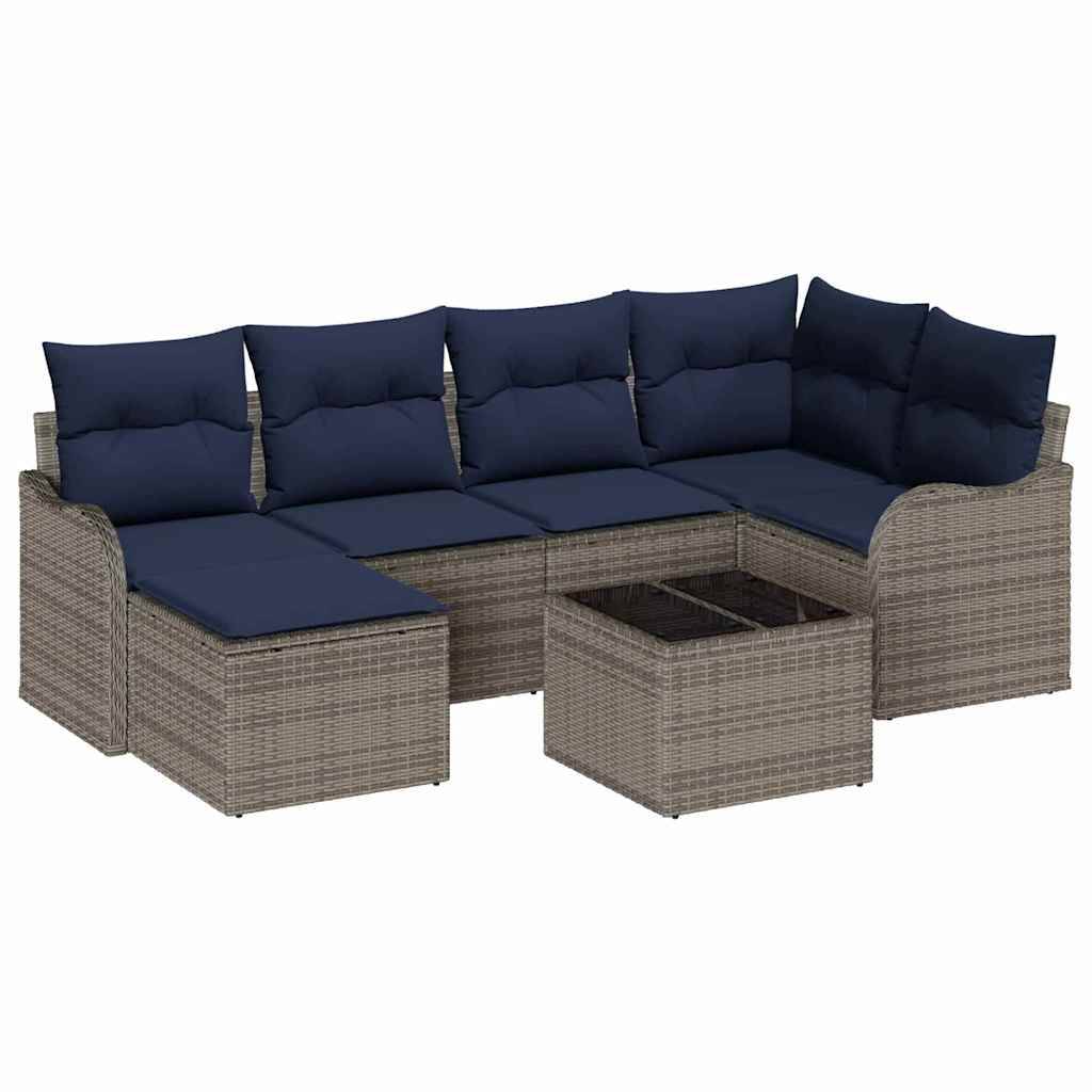 Outdoor-Korbgeflecht-Ecksofa mit marineblauen Kissen und passendem quadratischem Hocker auf weißem Hintergrund.