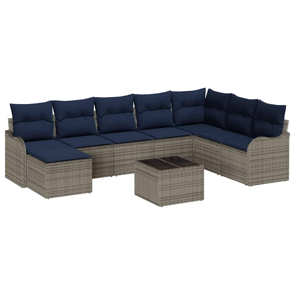 Outdoor-Ecksofa in L-Form mit grauem Rattangeflecht, marineblauen Kissen und passendem quadratischen Sitzkubus/Couchtisch.